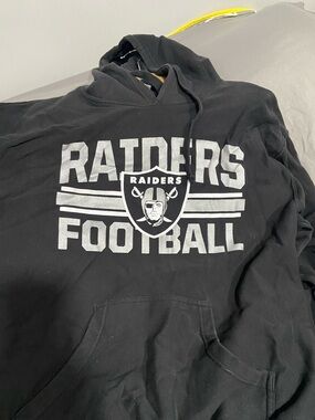 Riders by Lee Black Hoodie with White Raiders Football Logo